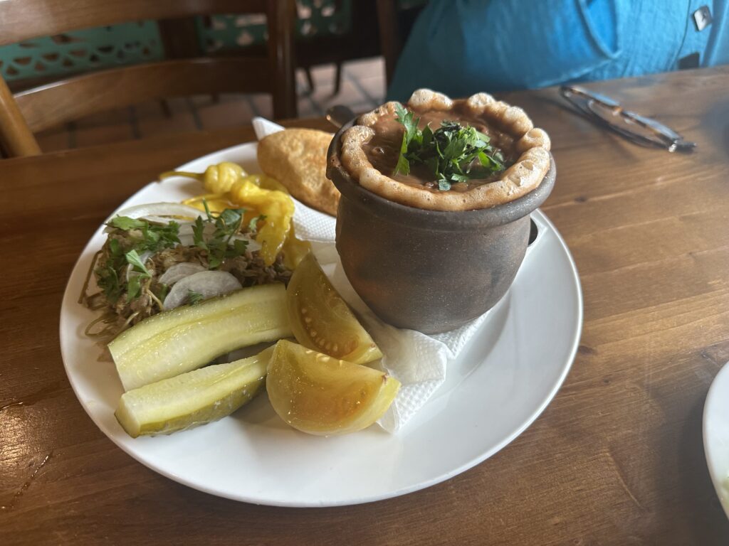lobio (red beans in clay pot) with mchadi (cornbread)+ pickles
